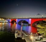 colored lights on bridge at night